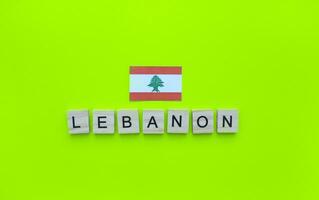 November 22, Lebanese Independence Day, the flag of Lebanon, a minimalistic banner with an inscription in wooden letters photo