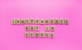 October 1, Independence Day in Cyprus, minimalistic banner with the inscription in wooden letters photo