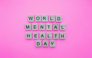 October 10, World Mental Health Day, minimalistic banner with the inscription in wooden letters photo