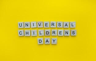 November 20, Universal Childrens Day, minimalistic banner with the inscription in wooden letters photo