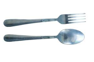 hand holding fork spoon on white background photo