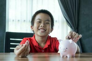 boy saving money photo