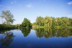 Summer fishing on a beautiful lake photo