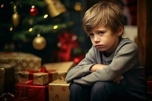 grave triste pequeño chico es sentado en frente de un Navidad árbol generativo ai foto