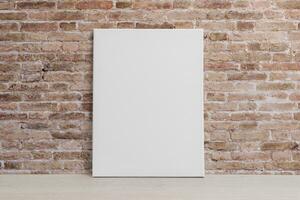 Blank art canvas leaning against the brick wall. Clean surface for mockup, art presentation photo