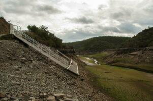 The Ponsul River is a affluent of the Tejo River, in Portugal, and is a very large river. At this time it is completely dry, without water and with its bed cracked due to climate change photo