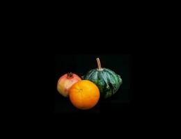 Decorative pumpkins in different shapes and colors photo