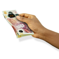 Fair hand holding 3D rendered 50 British pounds sterling notes isolated on transparent background png
