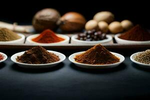 a variety of spices in bowls on a black background. AI-Generated photo