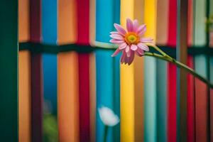 a pink flower is in front of a colorful fence. AI-Generated photo