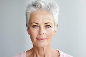 Beautiful gorgeous 50s mid aged mature woman looking at camera isolated on white. Mature old lady close up portrait. Healthy face skin care beauty, middle age skincare cosmetics. Generative Ai photo