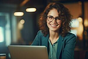 Happy business lady using laptop smiling wearing glasses working sitting at workplace in modern office. Generative Ai photo