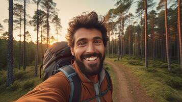 Happy traveler man with backpack taking selfie picture in the forest. Travel blogger or Freelance, Life style and technology concept. Generative Ai photo