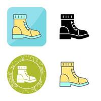 icono de vector de botas