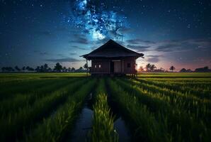 landscape view of a hut in the middle of a rice field with a milky way. long exposure photography. generative ai photo