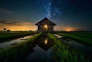 landscape view of a hut in the middle of a rice field with a milky way. long exposure photography. generative ai photo