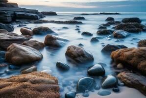 Beautiful sea views with relaxing and gentle rocks and waves. long exposure photography. generative ai photo