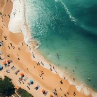 Aerial shot of a crowded beach with swimmers enjoying the waves photo