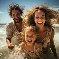 Smiling family playing in the ocean waves on a sunny day photo