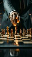 Business analogy Hand engages chessboard, symbolizing calculated planning and strategic comparisons Vertical Mobile Wallpaper AI Generated photo