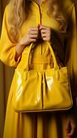 Handheld flair woman gracefully clutches yellow tote, infusing color into her ensemble Vertical Mobile Wallpaper AI Generated photo