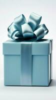Box in serene blue, white bow, isolated against clean white background. Striking contrast. Vertical Mobile Wallpaper AI Generated photo