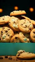 un papel caja derrames chocolate chip galletas en un tranquilo turquesa antecedentes vertical móvil fondo de pantalla ai generado foto