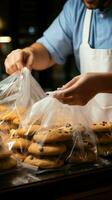 Detail shot Man neatly packaging cookies into a plastic grocery bag Vertical Mobile Wallpaper AI Generated photo