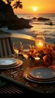 Beachfront romance Sunset dinner setting by the sea Vertical Mobile Wallpaper AI Generated photo