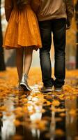 In love and style, a couples feet grace autumn leaves, a fashion forward embrace Vertical Mobile Wallpaper AI Generated photo