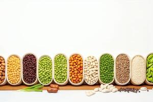 Assortment of beans in a wooden spoon on a white background. AI Generated. photo