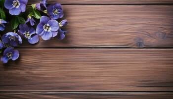 Violet flowers on wooden background. Top view with copy space. AI Generated. photo
