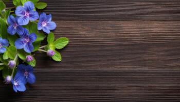 Beautiful blue flowers on wooden background. Top view with copy space. AI Generated. photo