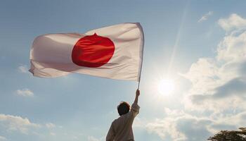 Man holding the flag of Japan against blue sky with sunrays. AI Generated. photo