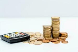 calculator and coins on white background, business and finance concept. AI Generated. photo