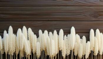 White pampas grass on brown wooden background with copy space. AI Generated. photo