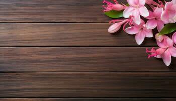 Beautiful pink flowers on wooden background. Top view with copy space. AI Generated. photo