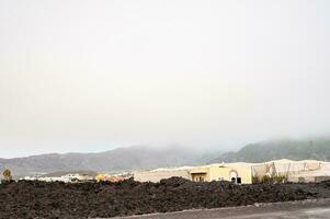 Solidified volcanic lava stream from the Cumbre Vieja volcano on the island of La Palma photo