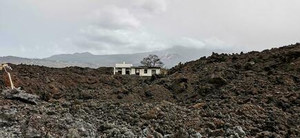 Solidified volcanic lava stream from the Cumbre Vieja volcano on the island of La Palma photo