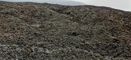 Solidified volcanic lava stream from the Cumbre Vieja volcano on the island of La Palma photo