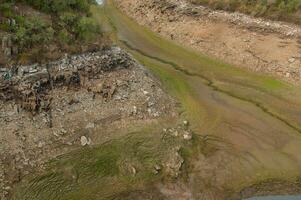 The Ponsul River is a affluent of the Tejo River, in Portugal, and is a very large river. At this time it is completely dry, without water and with its bed cracked due to climate change photo