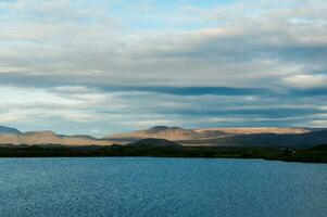 Stunning landscape of Skutustaoagigar lake in Iceland photo