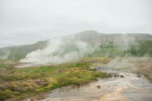 Geyser Stokkur, in Iceland photo