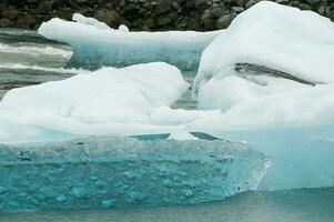 Icebergs in Jokulsarlon, a glacial lake in Iceland photo