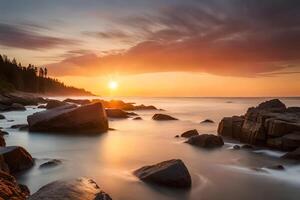A extreme harsh coast washed in warm colors in the midst of a astonishing nightfall. photo