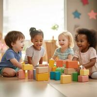 A group of children playing together and building with wooden blocks. photo