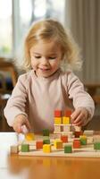 A young child using blocks to learn basic counting and math skills. photo