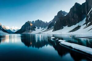 A immaculate snow capped lake settled internal parts the center of towering ice sheets and snow capped peaks. photo