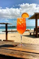 Aperol on top of a wooden table in front of the beach. ai generated photo