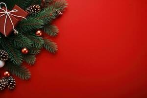 Christmas background with fir branches, cones and gift box on red background Ai generated photo